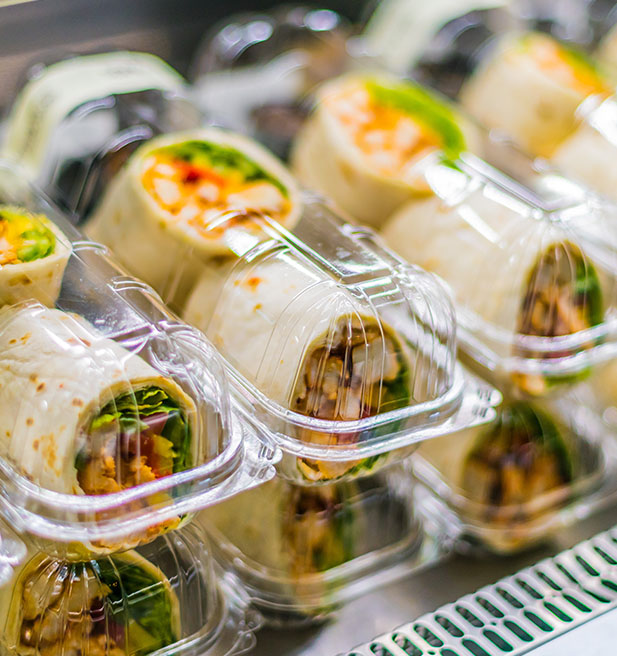 Prepared foods in clear plastic clamshells